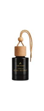Akasia Premium Car Scent in a glossy black bottle with a natural wood cap and a beige hanging cord, shown on a white background.